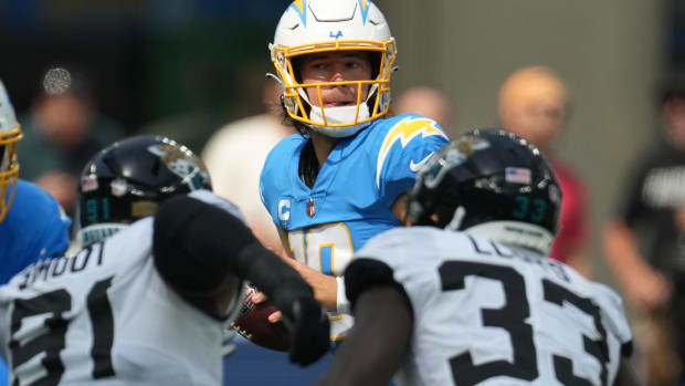 Sep 25, 2022; Inglewood, California, USA; Los Angeles Chargers quarterback Justin Herbert (10) throws the ball against the Jacksonville Jaguars in the first half at SoFi Stadium. Mandatory Credit: Kirby Lee-USA TODAY Sports