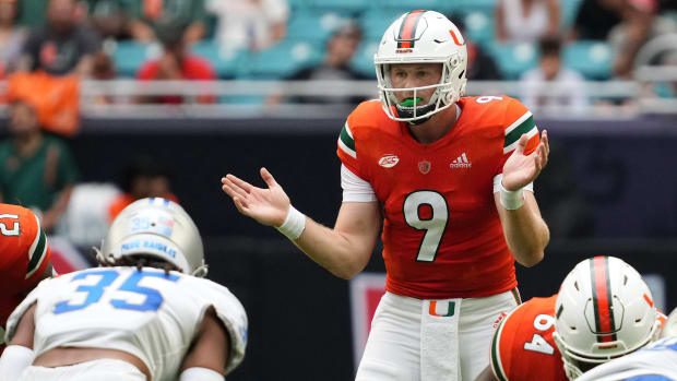 Miami QB Tyler Van Dyke waits for a shotgun snap during a game against Middle Tennessee