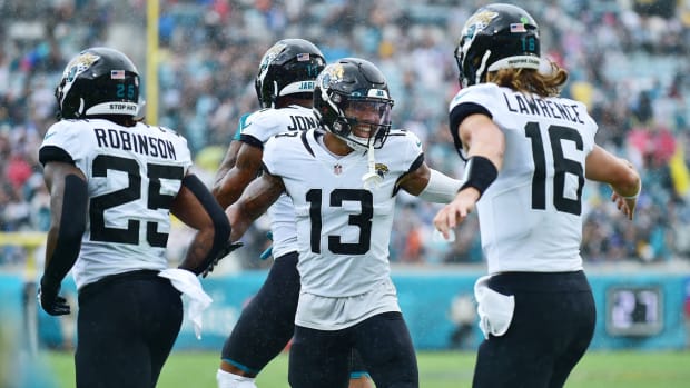 Jaguars players celebrate after a touchdown