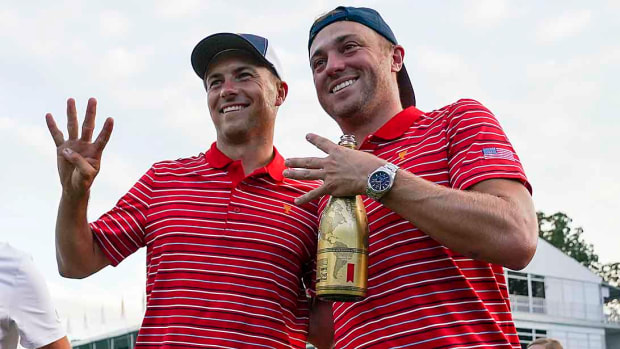 Jordan Spieth and Justin Thomas celebrate after winning the 2022 Presidents Cup.