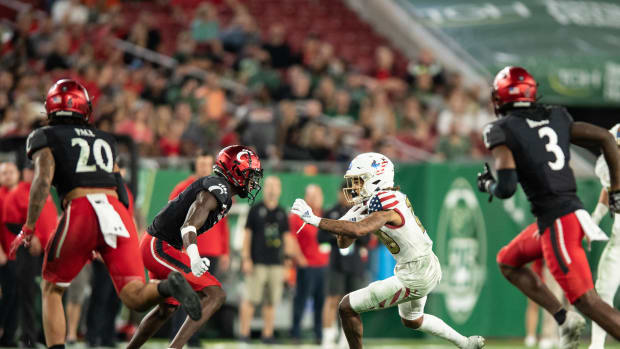 Nov 12, 2021; Tampa, Florida, USA; South Florida Bulls wide receiver Xavier Weaver (10) runs after the catch in the 3rd quarter against the Cincinnati Bearcats at Raymond James Stadium. Mandatory Credit: Jeremy Reper-USA TODAY Sports