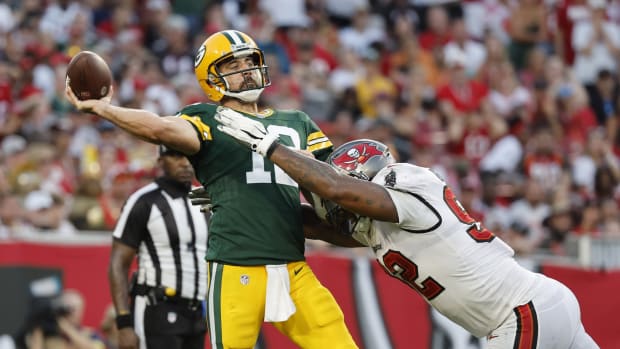 Packers quarterback Aaron Rodgers faces pressure during his team's 14-12 win over the Buccaneers.