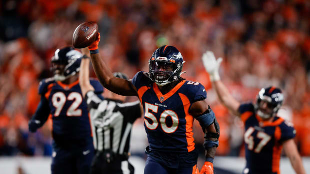 Denver Broncos linebacker Jonas Griffith (50) celebrates after an interception in the fourth quarter against the San Francisco 49ers at Empower Field at Mile High.