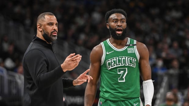 Apr 7, 2022; Milwaukee, Wisconsin, USA; Boston Celtics head coach Ime Udoka talks to guard Jaylen Brown (7) in the 4th quarter during game against the Milwaukee Bucks at Fiserv Forum.