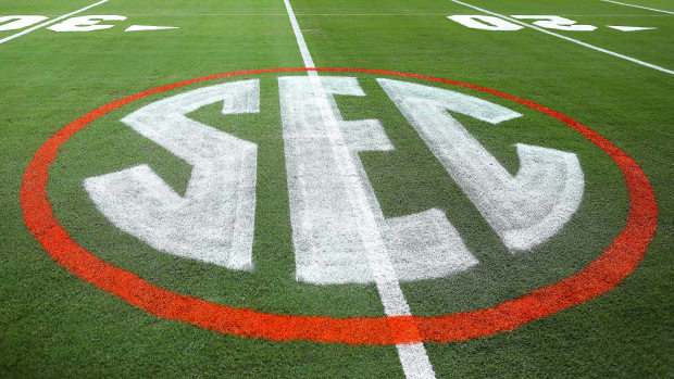 The SEC logo is painted on Florida’s field