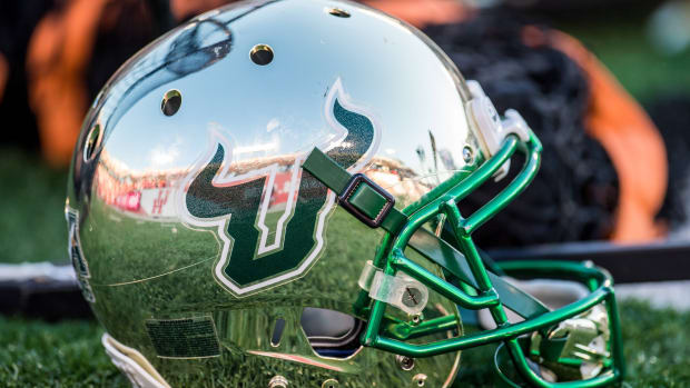 A South Florida football helmet sits on the sidelines during a game.