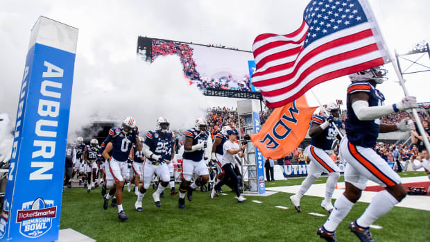 Auburn takes the field for the Birmingham Bowl at Protective Stadium in Birmingham, Ala., on Tuesday December 28, 2021.