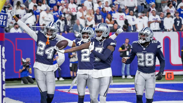 Sep 26, 2022; East Rutherford, NJ, USA; Dallas Cowboys cornerback Trevon Diggs (7) celebrates with teammates after making an interception during the fourth quarter against the New York Giants at MetLife Stadium.
