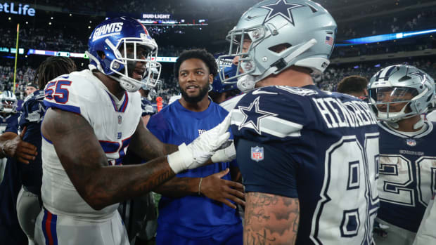 New York Giants linebacker Jihad Ward (55) and Dallas Cowboys tight end Peyton Hendershot (89) confront each other on the field after the Cowboys beat the Giants 23-16 in an NFL football game, Monday, Sept. 26, 2022, in East Rutherford, N.J. (AP Photo/Adam Hunger)