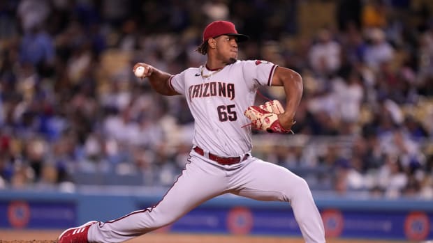 Sep 19, 2022; Los Angeles, California, USA; Arizona Diamondbacks pitcher Luis Frias (65) throws in the eighth inning against the Los Angeles Dodgers at Dodger Stadium. Mandatory Credit: Kirby Lee-USA TODAY Sports
