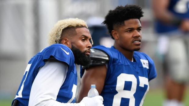 New York Giants wide receivers Odell Beckham Jr., (left) and Sterling Shepard (right) watch drills during training camp on Aug. 1, 2018.