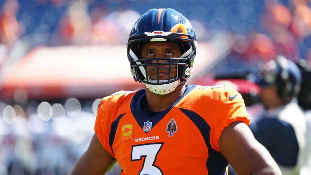Broncos quarterback Russell Wilson (3) before the game against the Texans at Empower Field at Mile High.