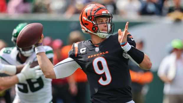 Sep 25, 2022; East Rutherford, New Jersey, USA; Cincinnati Bengals quarterback Joe Burrow (9) throws a pass against the New York Jets during the first half at MetLife Stadium.