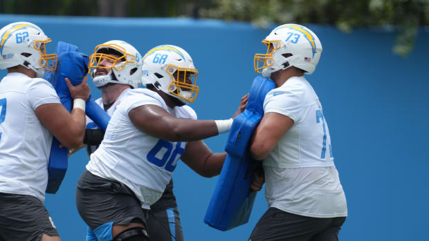Jun 14, 2022; Costa Mesa, California, USA; Los Angeles Chargers lineman Jamaree Salyer (68) and tackle Foster Sarell (73) participate in blocking drills during minicamp at the Hoag Performance Center. Mandatory Credit: Kirby Lee-USA TODAY Sports