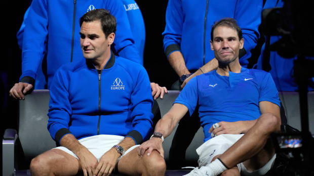 An emotional Roger Federer of Team Europe is consoled by his playing partner Rafael Nadal after their Laver Cup doubles match against Team World's Jack Sock and Frances Tiafoe at the O2 arena in London, Friday, Sept. 23, 2022.