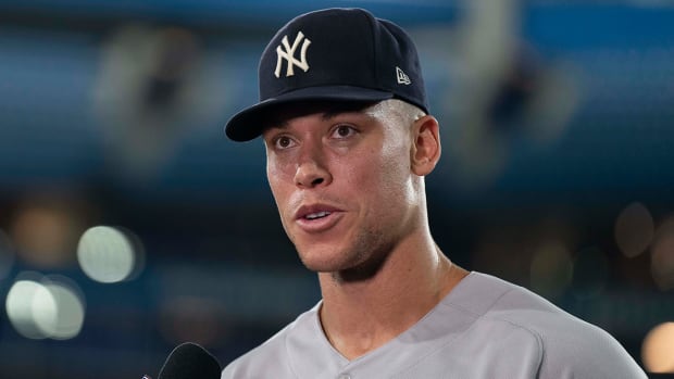 Yankees designated hitter Aaron Judge (99) is interviewed by the MLB Network at the at the end of the game against the Blue Jays.