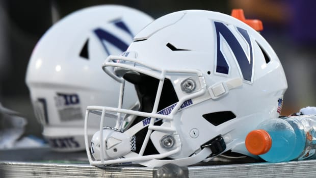 A Northwestern Wildcats helmet sits on an equipment chest during the fourth quarter at Wallace Wade Stadium.