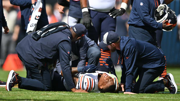 Chicago Bears running back David Montgomery (32) is attended to by trainers after being injured in the first quarter against the Houston Texans at Soldier Field.