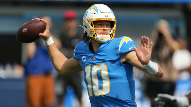 Sep 25, 2022; Inglewood, California, USA; Los Angeles Chargers quarterback Justin Herbert (10) throws the ball against the Jacksonville Jaguars in the first half at SoFi Stadium. Mandatory Credit: Kirby Lee-USA TODAY Sports