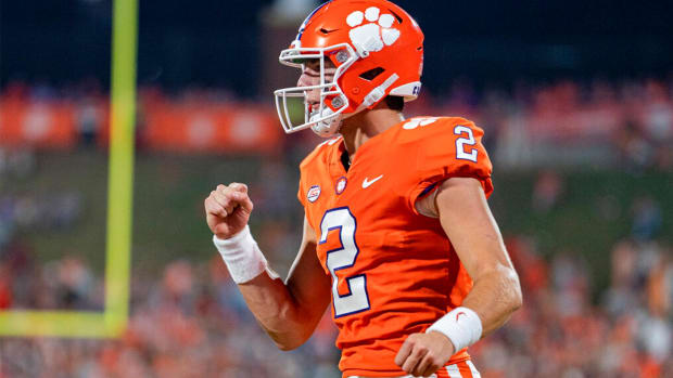 Clemson quarterback Cade Klubnik reacts after a touchdown by running back Kobe Pace during the second half of the team's NCAA college football game against Louisiana Tech on Saturday, Sept. 17, 2022, in Clemson, S.C. (AP Photo/Jacob Kupferman)