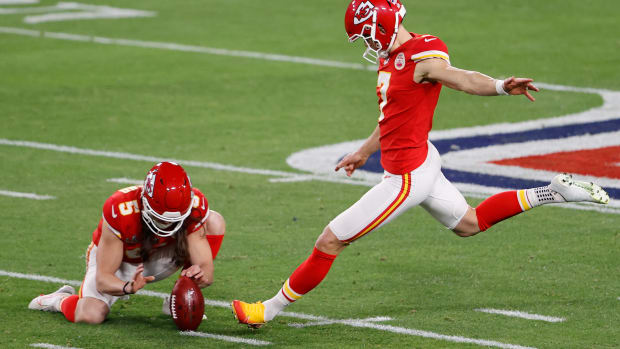 Feb 7, 2020; Tampa, FL, USA; Kansas City Chiefs kicker Harrison Butker (7) kicks a 49 yard field goal from the hold of punter Tommy Townsend (5) against the Tampa Bay Buccaneers during the first quarter of Super Bowl LV at Raymond James Stadium. Mandatory Credit: Kim Klement-USA TODAY Sports
