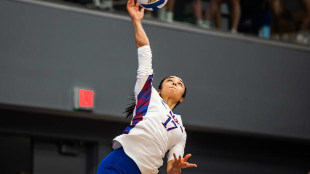 Kansas redshirt-freshman Ayah Elnady serves the ball against the Texas Longhorns on September 21, 2022 in Horejsi Family Volleyball Arena