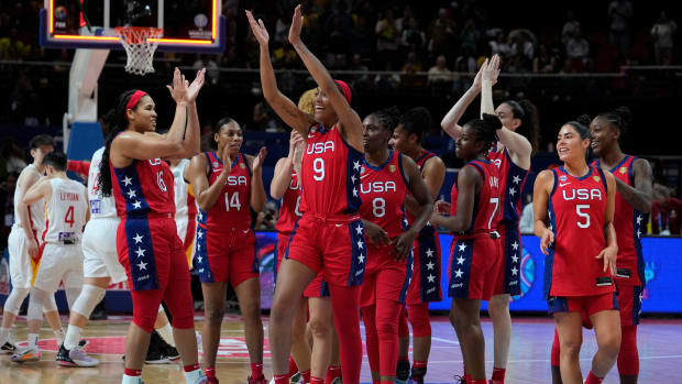Players form the United States celebrate their win over China in their gold medal game at the women’s Basketball World Cup in Sydney, Australia.