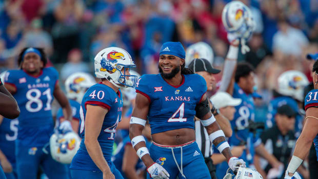 Oct 1, 2022; Lawrence, Kansas, USA; Kansas Jayhawks safety Marvin Grant (4) celebrates after the game against the Iowa State Cyclones at David Booth Kansas Memorial Stadium.