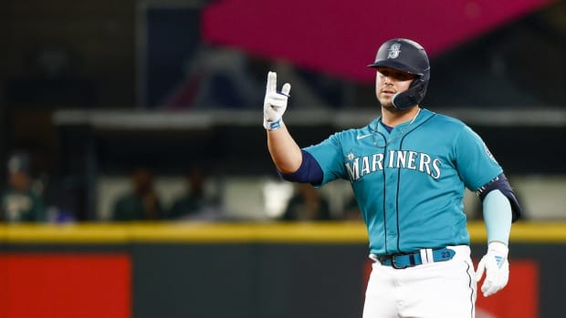Sep 30, 2022; Seattle, Washington, USA; Seattle Mariners first baseman Ty France (23) reacts after hitting an RBI-double against the Oakland Athletics during the first inning at T-Mobile Park. Mandatory Credit: Joe Nicholson-USA TODAY Sports