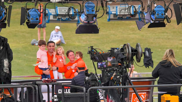 Clemson Athletic staff get a photo on stage of the ESPN College GameDay Built by The Home Depot on Bowman Field at Clemson University in Clemson Friday, September 30, 2022. The show's 427th road show, the eighth at Clemson before the game with NC State, airs on television from 9 a.m. to noon Eastern time. Espn College Gameday On Bowman Field At Clemson