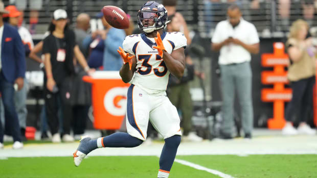 Oct 2, 2022; Paradise, Nevada, USA; Denver Broncos running back Javonte Williams (33) warms up before a game against the Las Vegas Raiders at Allegiant Stadium. Mandatory Credit: Stephen R. Sylvanie-USA TODAY Sports