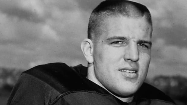 Former UW football standout Rick Redman passed away on Friday.