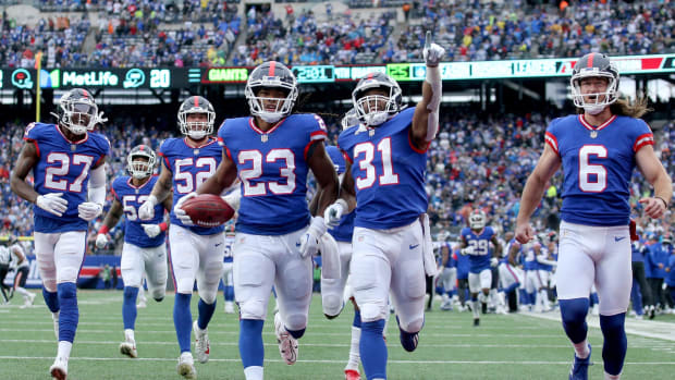 Oct 2, 2022; East Rutherford, New Jersey, USA; New York Giants running back Gary Brightwell (23) celebrates with teammates after recovering a muffed punt during the fourth quarter against the Chicago Bears at MetLife Stadium.