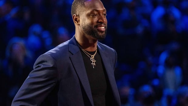 NBA great Dwyane Wade is honored for being selected to the NBA 75th Anniversary Team during halftime in the 2022 NBA All-Star Game at Rocket Mortgage FieldHouse.