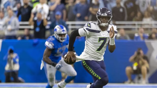 Oct 2, 2022; Detroit, Michigan, USA; Seattle Seahawks quarterback Geno Smith (7) runs with the ball against the Detroit Lions during the first quarter at Ford Field.