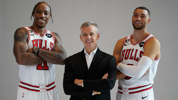 Chicago Bulls' DeMar DeRozan, Zach LaVine, and head coach Billy Donovan