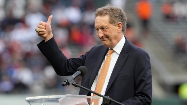 SF Giants CEO and president Larry Baer gives a thumbs up to the crowd during a speech. (2022)