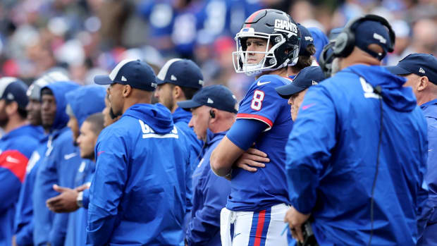 Oct 2, 2022; East Rutherford, New Jersey, USA; New York Giants quarterback Daniel Jones (8) looks on from the sideline during the fourth quarter against the Chicago Bears at MetLife Stadium.