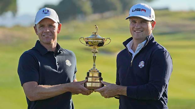 Ryder Cup captains Luke Donald and Zach Johnson pose with the Cup, one year out of the 2023 matches at Marco Simone in Rome, Italy.