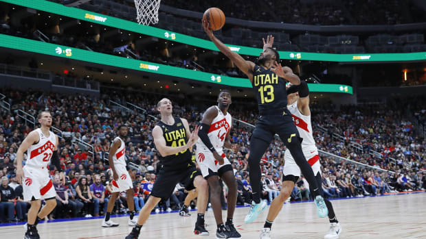 Utah Jazz guard Jared Butler (13) takes a shot over Toronto Raptors forward Gabe Brown (44) during the fourth quarter at Rogers Place.