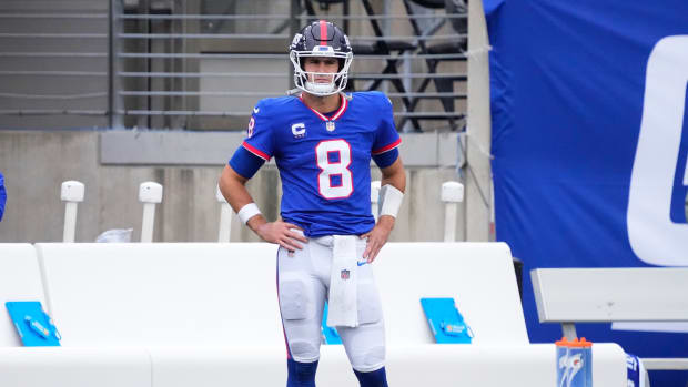 Oct 2, 2022; East Rutherford, New Jersey, USA; New York Giants quarterback Daniel Jones (8) looks on from the sideline while temporarily leaving the game due to an injury against the Chicago Bears during the first half at MetLife Stadium.