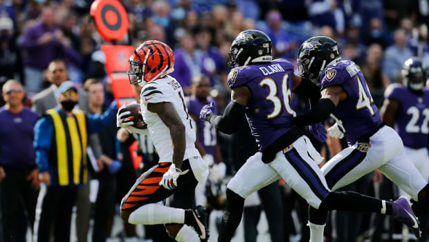 Cincinnati Bengals wide receiver Ja'Marr Chase (1) runs a catch out of bounds to stop the clock late in the second quarter of the NFL Week 7 game between the Baltimore Ravens and the Cincinnati Bengals at M&T Bank Stadium in Baltimore on Sunday, Oct. 24, 2021. The Bengals led 13-10 at halftime. Cincinnati Bengals At Baltimore Ravens Week 7