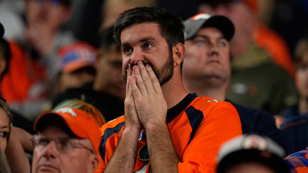 A despondent Broncos fan during the team’s loss to the Colts.
