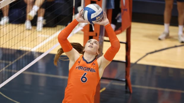 Virginia volleyball setter Gabby Easton sets the ball during UVA's game against Pittsburgh.