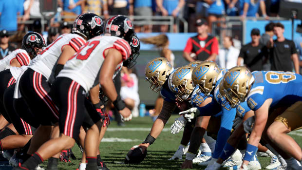 The UCLA Bruins offensive line is seen on a line of the scrimmage against the Utah Utes during the fourth quarter at Rose Bowl.