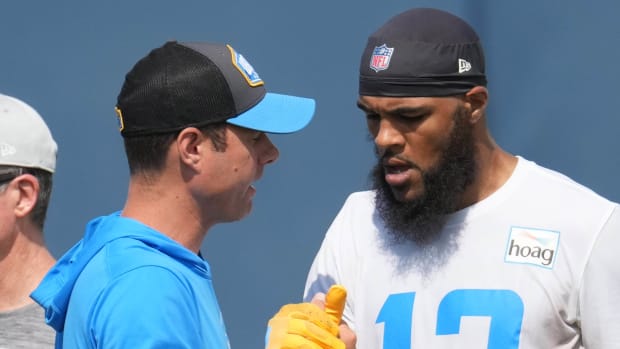 Jun 15, 2021; Costa Mesa, CA, USA; Los Angeles Chargers receiver Keenan Allen (13) talks with coach Brandon Staley during minicamp at the Hoag Performance Center. Mandatory Credit: Kirby Lee-USA TODAY Sports