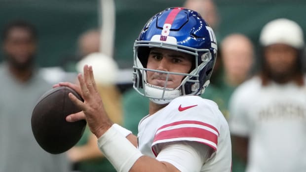 Oct 9, 2022; London, United Kingdom; New York Giants quarterback Daniel Jones (8) throws the ball in the second quarter against the Green Bay Packers during an NFL International Series game at Tottenham Hotspur Stadium.