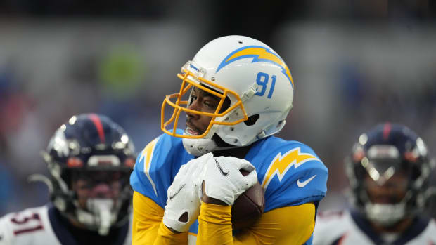 Jan 2, 2022; Inglewood, California, USA; Los Angeles Chargers wide receiver Mike Williams (81) catches a touchdown pass in the second half against the Denver Broncos at SoFi Stadium. Mandatory Credit: Kirby Lee-USA TODAY Sports
