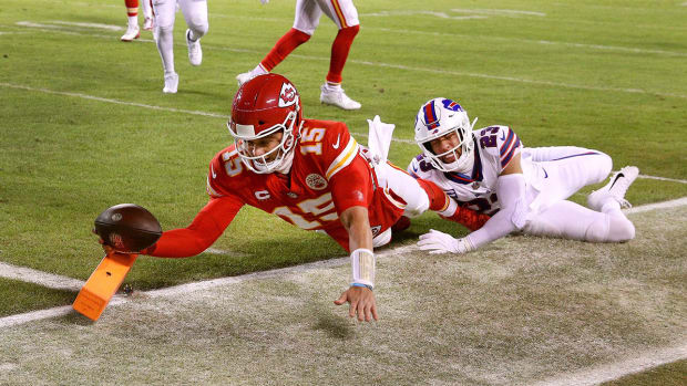 Patrick Mahomes dives for the pylon to score a touchdown against the Bills