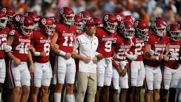 Oklahoma Sooners head coach Brent Venables lines up with his team before the Red River Showdown college football game between the University of Oklahoma (OU) and Texas at the Cotton Bowl in Dallas, Saturday, Oct. 8, 2022. Texas won 49-0.
